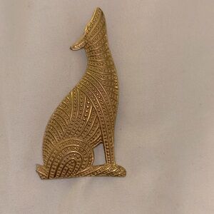 Gold tone vintage wolf brooch